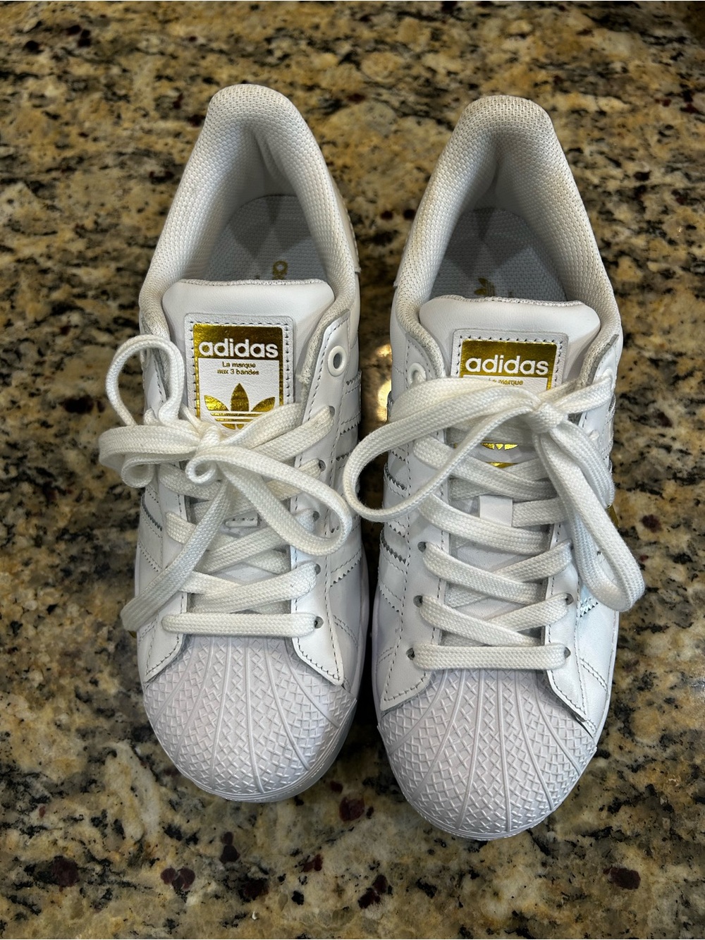 adidas White Sneakers with Gold Logo Accents
